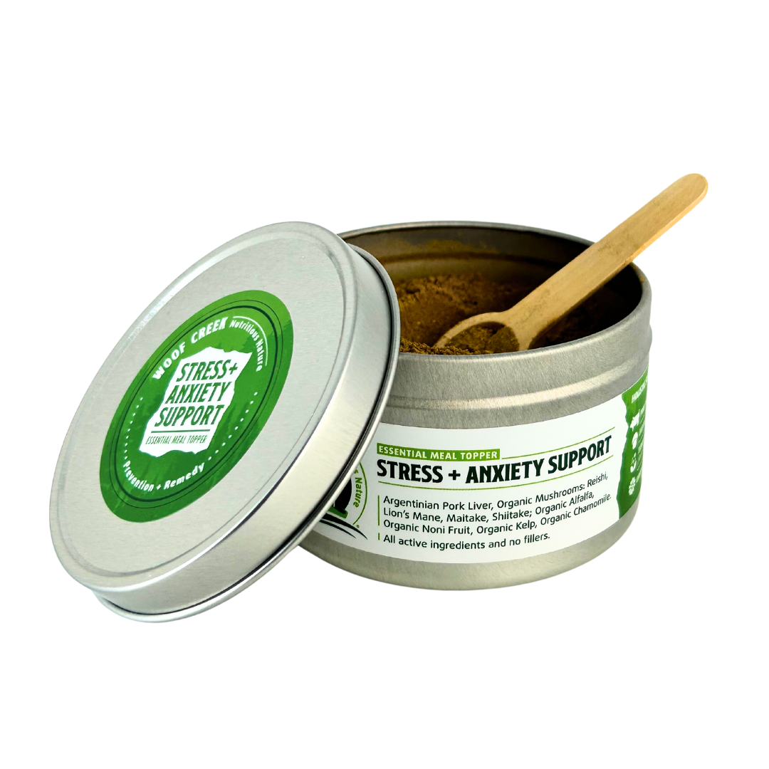 Tin of 'Stress + Anxiety Support' with a wooden spoon on a white background