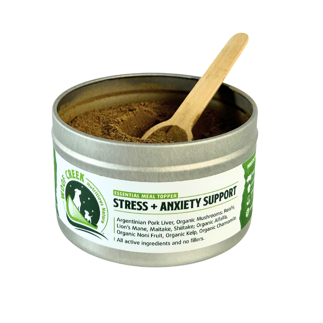 Tin of 'Stress + Anxiety Support' with a wooden scoop on a white background