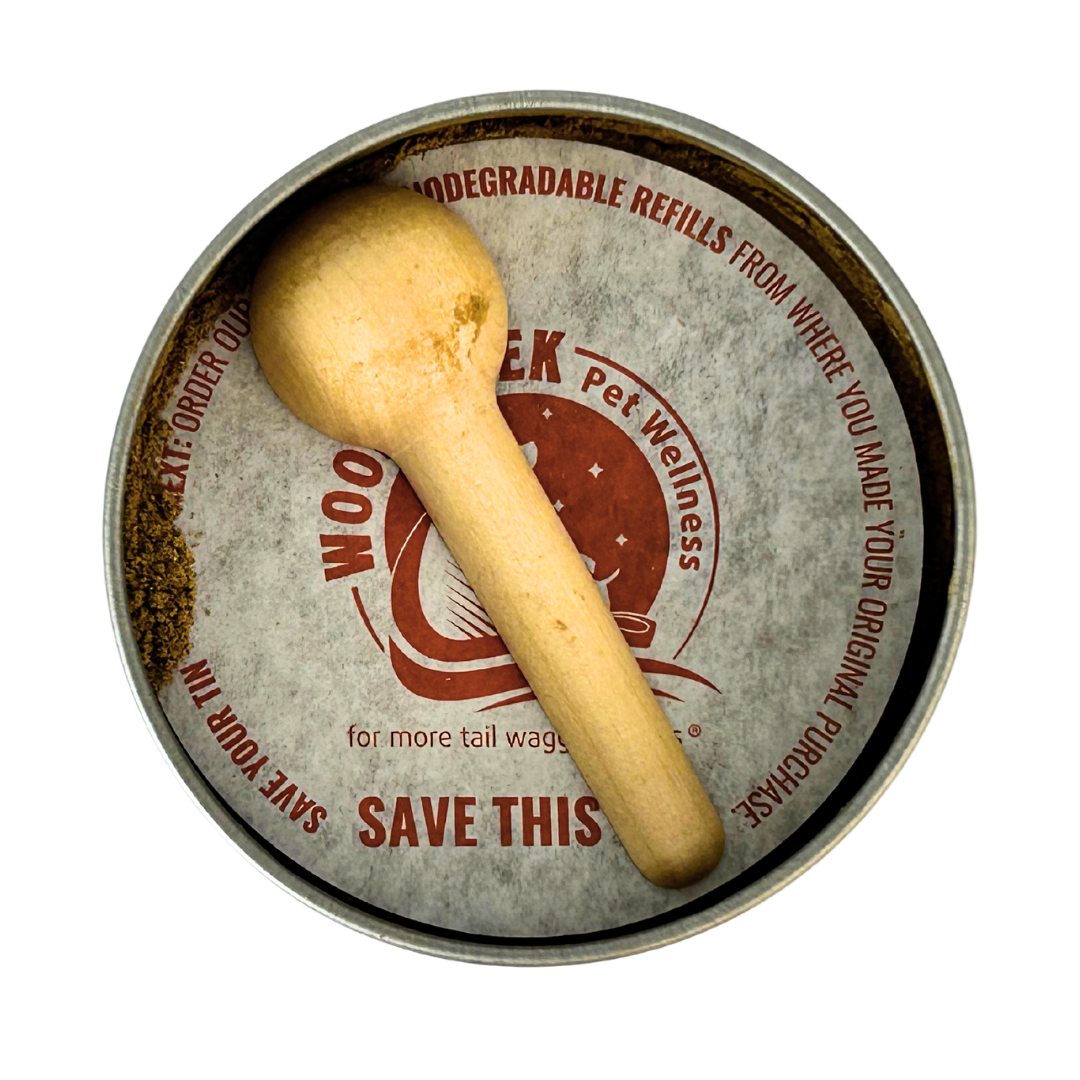 Wooden dog toy with a metal container labeled 'Pet Wellness' on a white background