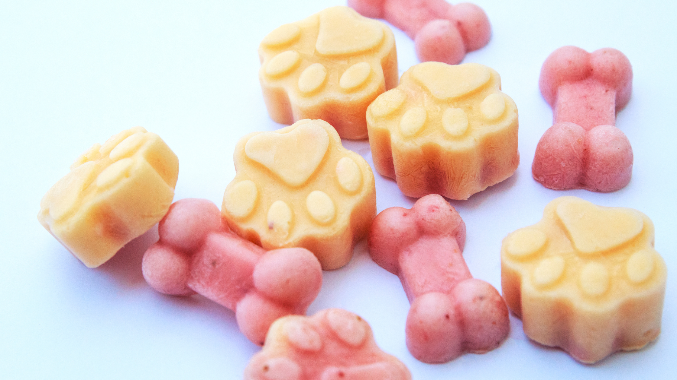mix of red and yellow frozen dog treats 