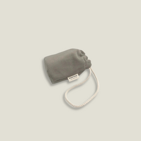 cotton fabric poop bag holder in a taupe color
