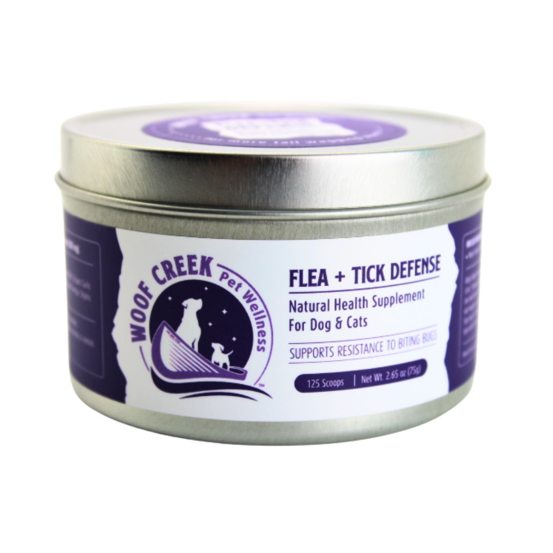 Tin of Woof Creek Pet Wellness Flea + Tick Defense supplement on a white background