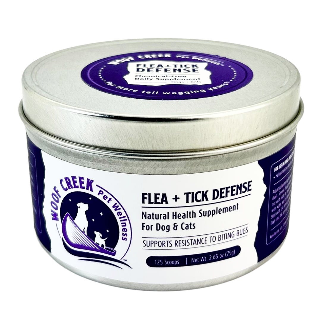 Tin of Woof Creek Pet Wellness Flea + Tick Defense supplement for dogs and cats on a white background