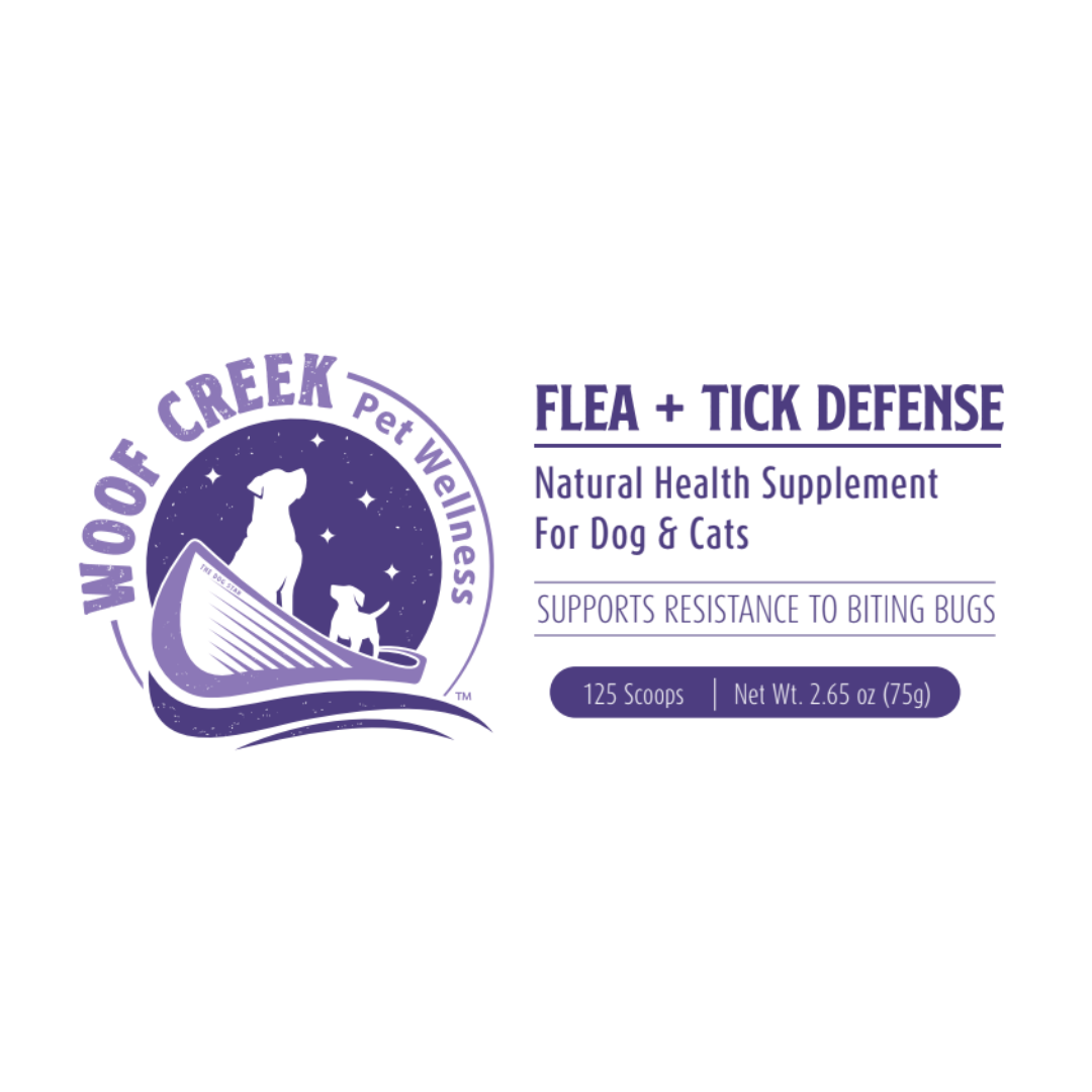 Woof Creek Pet Wellness Flea + Tick Defense supplement label on a white background