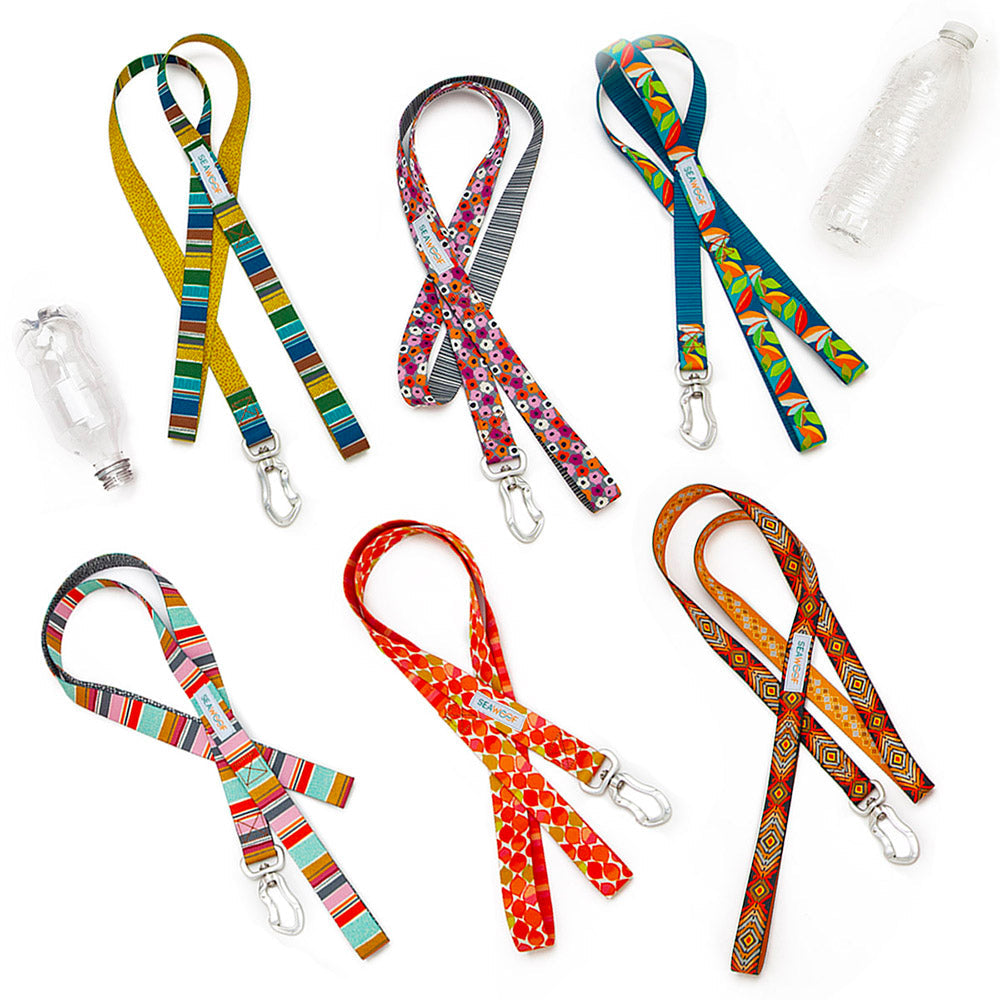 Set of colorful dog leashed with various patterns on a white background