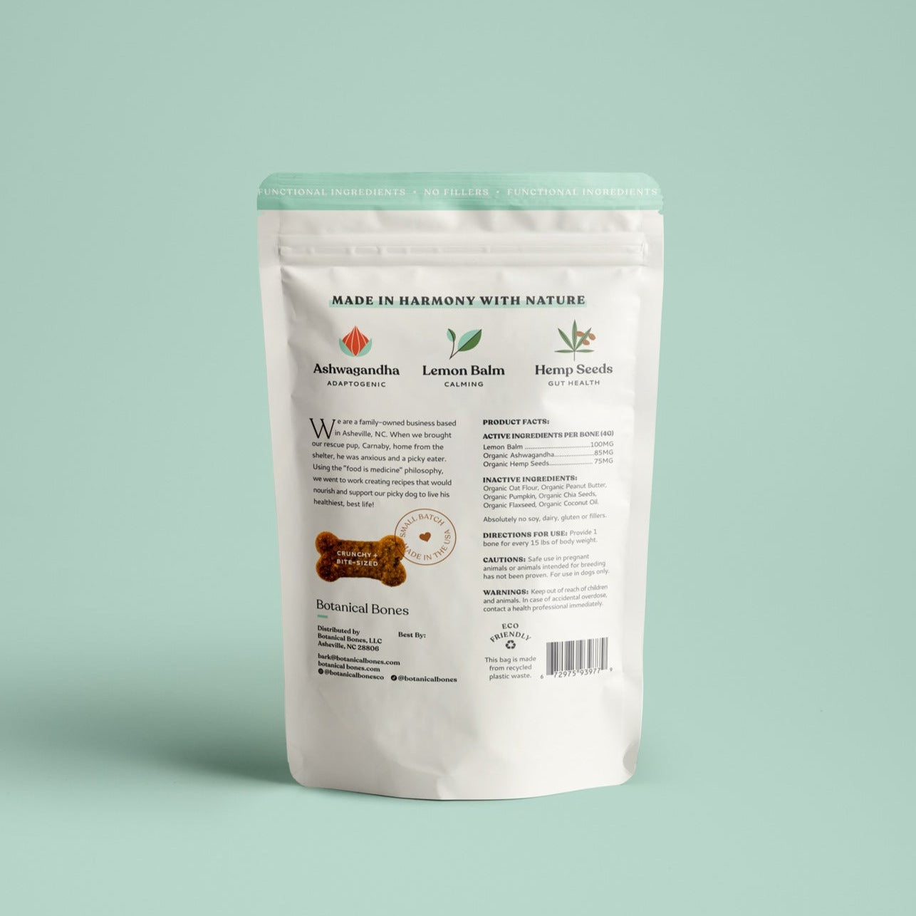 Ashwagandha dog treats package with natural ingredients on a light green background.