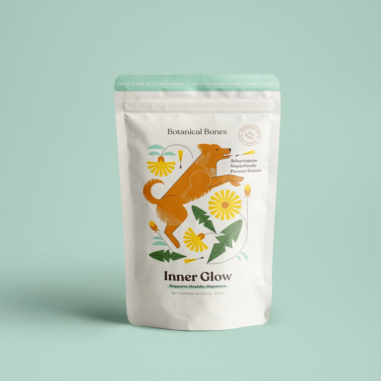 Package of 'Inner Glow' Botanical Bones digestive dog treats with a dog illustration on a light green background