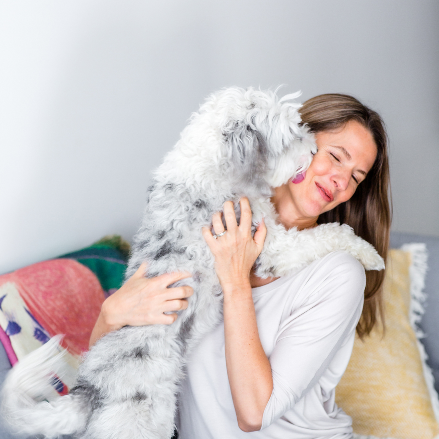 Jen's dog licking her cheek