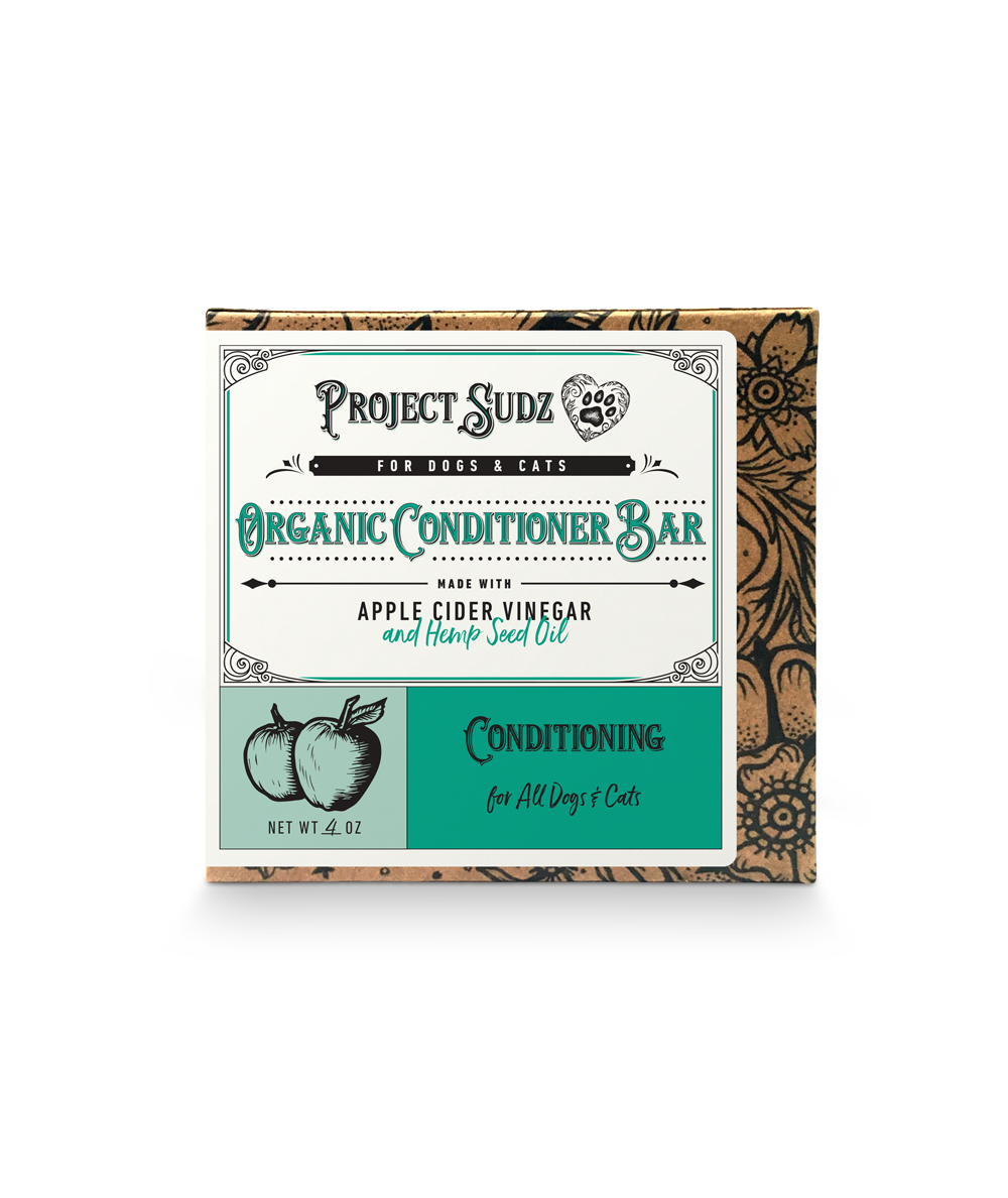 Project Sudz all-natural dog conditioner bar packaging on a white background