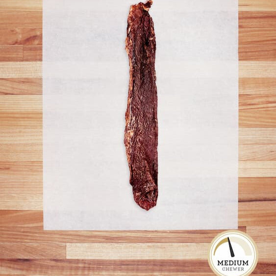 Large piece of beef weasand on parchment paper.