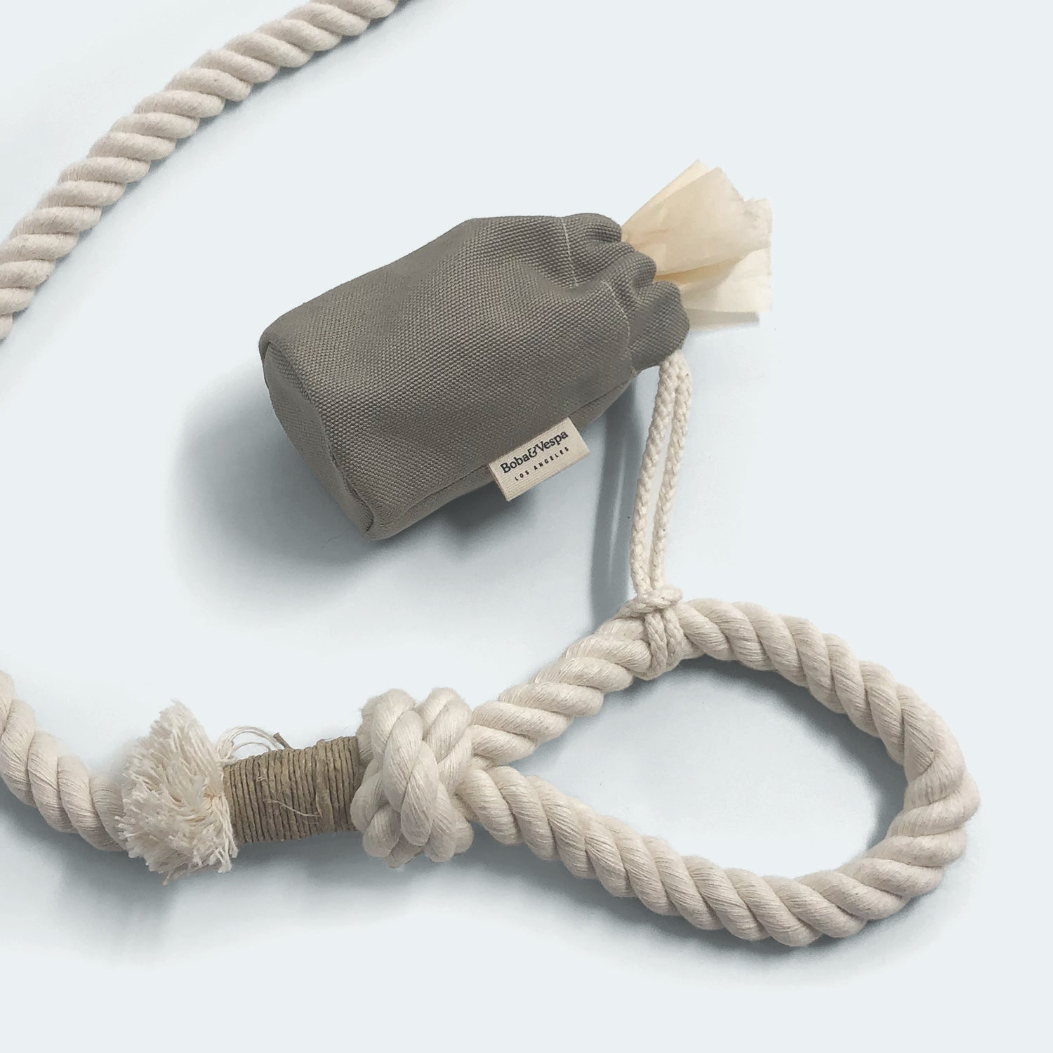 Cloth Poop Bag Holder attached to dog leash