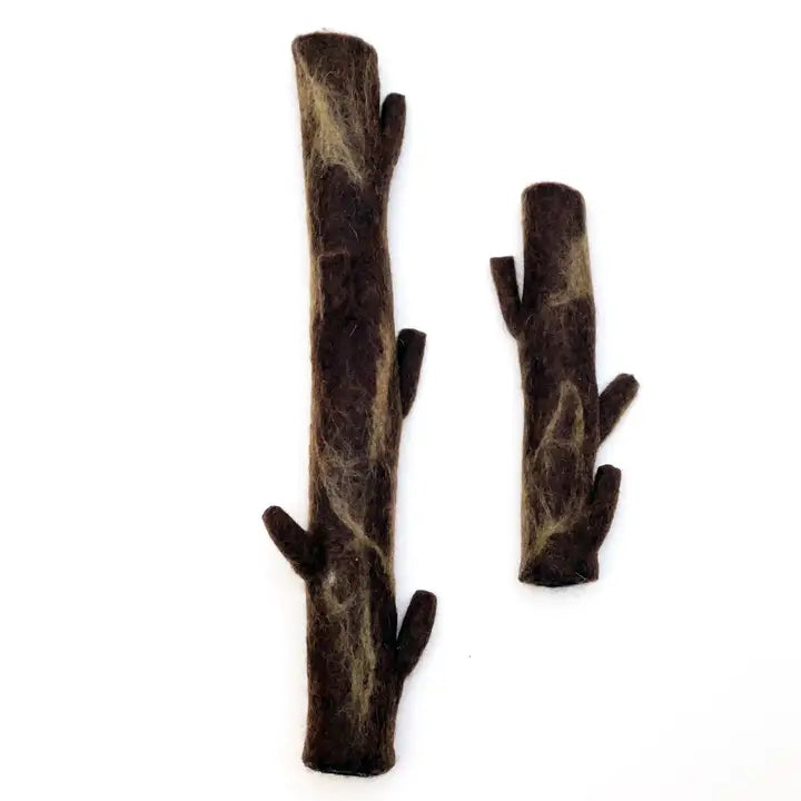 Browm and beige colored stick for dogs made in wool.
