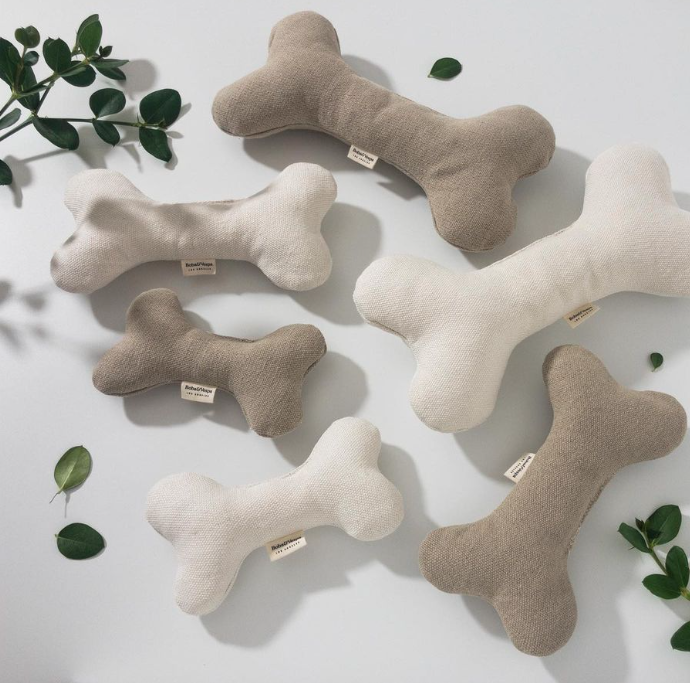 Plush dog top bone toy