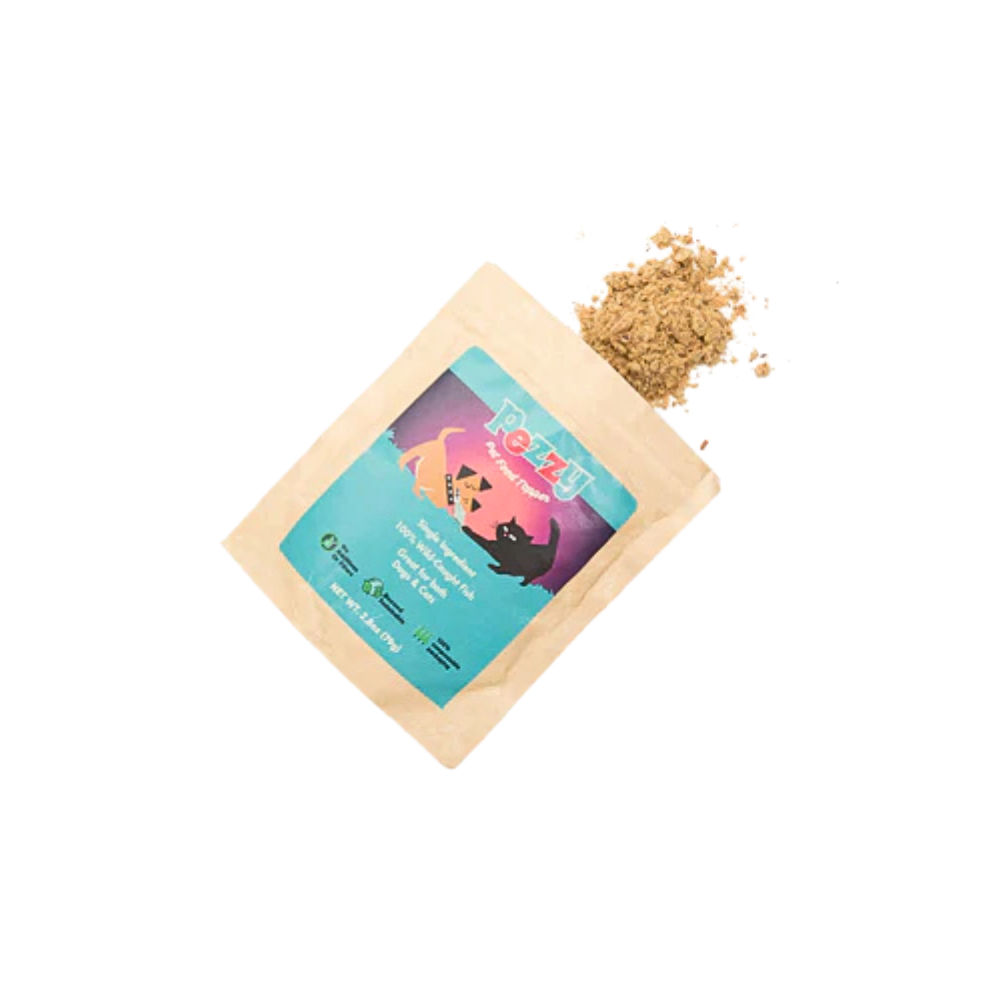 Pouch of devil fish dog food topper with a colorful label on a white background